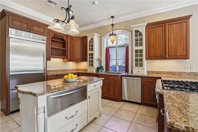 192 Forest Oaks Dr, New Orleans, LA 70131 - kitchen with a warming drawer, visible vents, a sink, appliances with stainless steel finishes, and crown molding