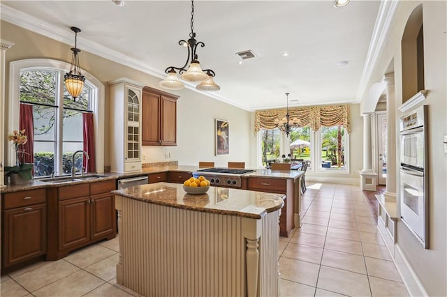 192 Forest Oaks Dr, New Orleans, LA 70131 - kitchen with a center island, ornamental molding, stone counters, a peninsula, and a sink
