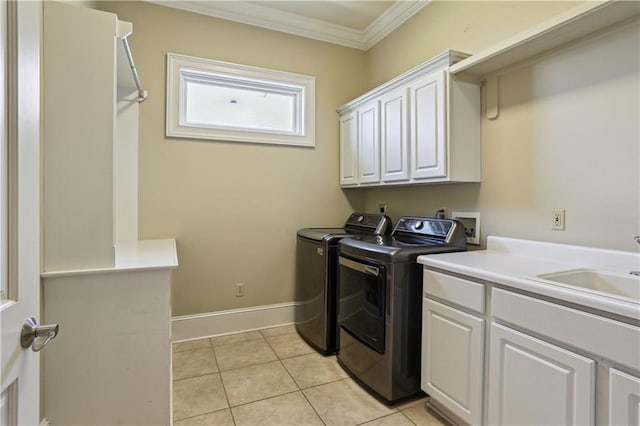 192 Forest Oaks Dr, New Orleans, LA 70131 - washroom with ornamental molding, a sink, washing machine and dryer, cabinet space, and light tile patterned floors