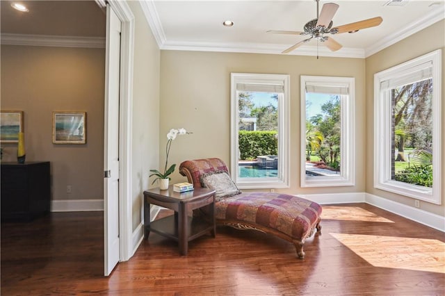 192 Forest Oaks Dr, New Orleans, LA 70131 - living area with ceiling fan, wood finished floors, baseboards, and ornamental molding