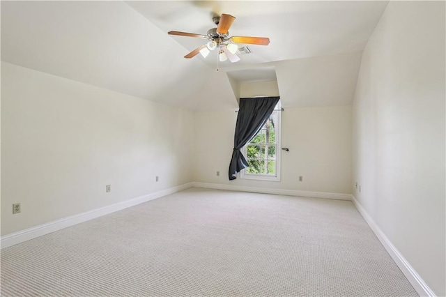 192 Forest Oaks Dr, New Orleans, LA 70131 - additional living space with vaulted ceiling, light colored carpet, baseboards, and ceiling fan