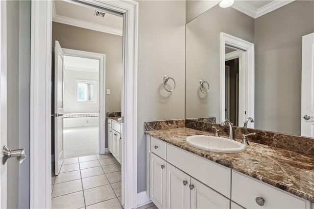 192 Forest Oaks Dr, New Orleans, LA 70131 - full bath featuring tile patterned floors, visible vents, vanity, and crown molding