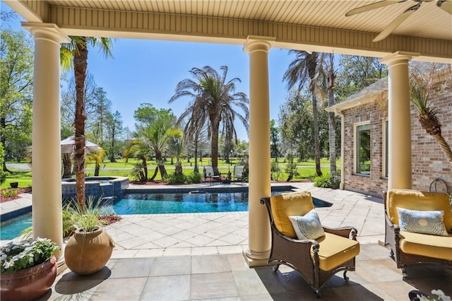 192 Forest Oaks Dr, New Orleans, LA 70131 - view of swimming pool featuring ceiling fan, a pool with connected hot tub, and a patio