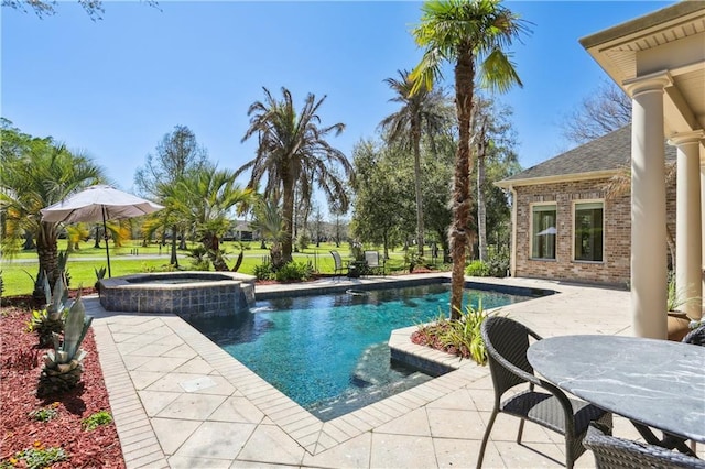 192 Forest Oaks Dr, New Orleans, LA 70131 - view of pool with a pool with connected hot tub and a patio area