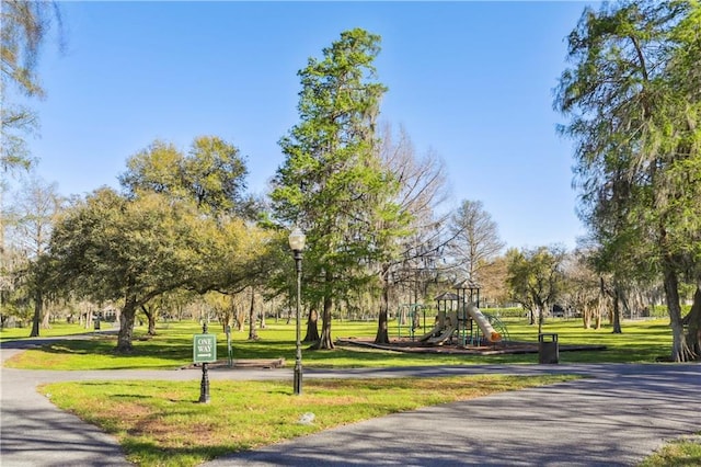 192 Forest Oaks Dr, New Orleans, LA 70131 - surrounding community with a yard and playground community