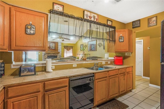 1504 Kings Row, Slidell, LA 70461 - kitchen with black dishwasher, a sink, light tile patterned floors, a ceiling fan, and light countertops