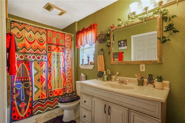 1504 Kings Row, Slidell, LA 70461 - bathroom with toilet, vanity, a textured ceiling, a shower with curtain, and tile patterned flooring
