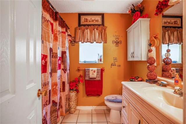 1504 Kings Row, Slidell, LA 70461 - bathroom with tile patterned flooring, vanity, toilet, a shower with shower curtain, and a textured ceiling