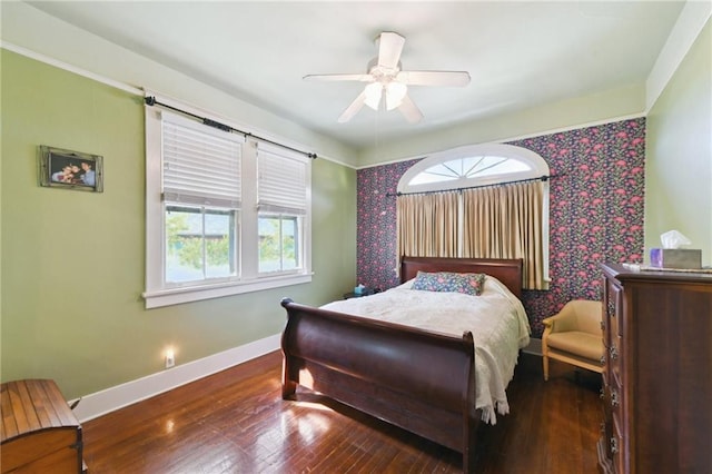 1930 N Rampart St, New Orleans, LA 70116 - bedroom featuring baseboards, hardwood / wood-style flooring, and a ceiling fan