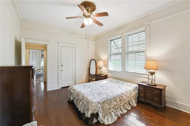 1930 N Rampart St, New Orleans, LA 70116 - bedroom featuring ornamental molding, baseboards, dark wood-style flooring, and ceiling fan