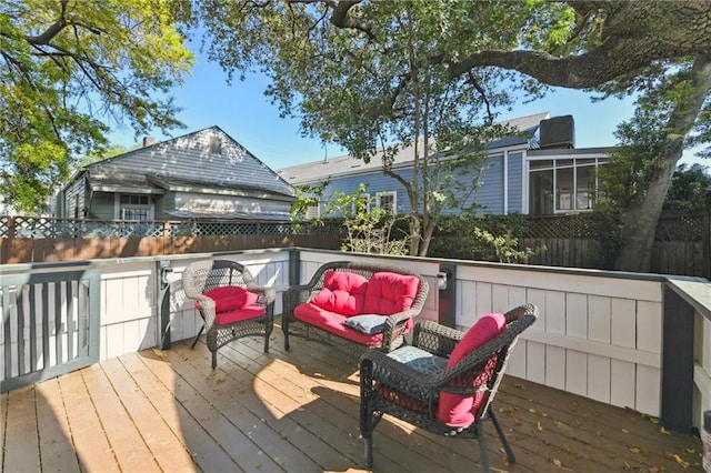 1930 N Rampart St, New Orleans, LA 70116 - wooden deck with an outdoor living space and fence