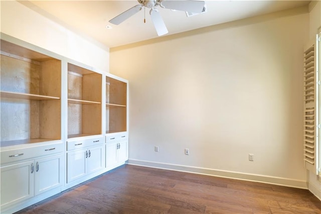 989 Beauregard Pkwy, Covington, LA 70433 - unfurnished room with baseboards, ceiling fan, and dark wood-style floors