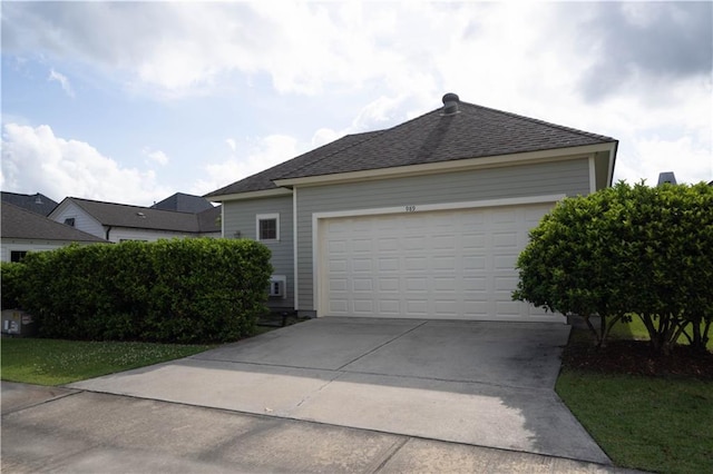 989 Beauregard Pkwy, Covington, LA 70433 - garage with concrete driveway