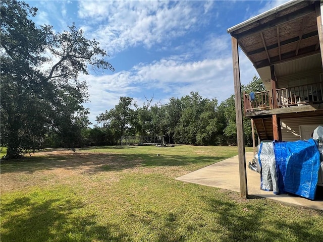 34062 Laurent Rd, Slidell, LA 70460 - view of green lawn with a patio area