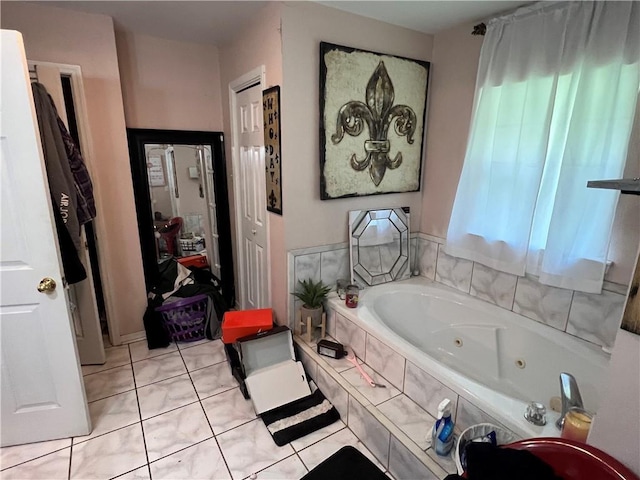 34062 Laurent Rd, Slidell, LA 70460 - full bathroom featuring tile patterned flooring and a whirlpool tub