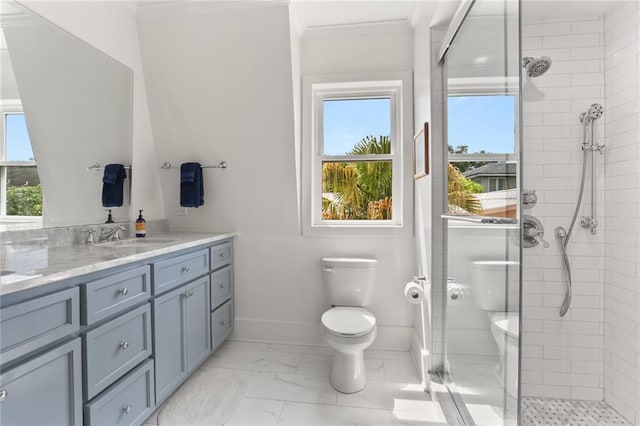 303 Audubon St, New Orleans, LA 70118 - bathroom featuring toilet, a shower stall, vanity, crown molding, and marble look tile flooring