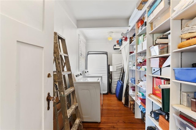 303 Audubon St, New Orleans, LA 70118 - washroom with washer and clothes dryer and hardwood / wood-style floors