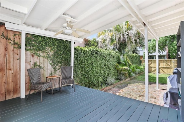 303 Audubon St, New Orleans, LA 70118 - deck with a ceiling fan and a patio