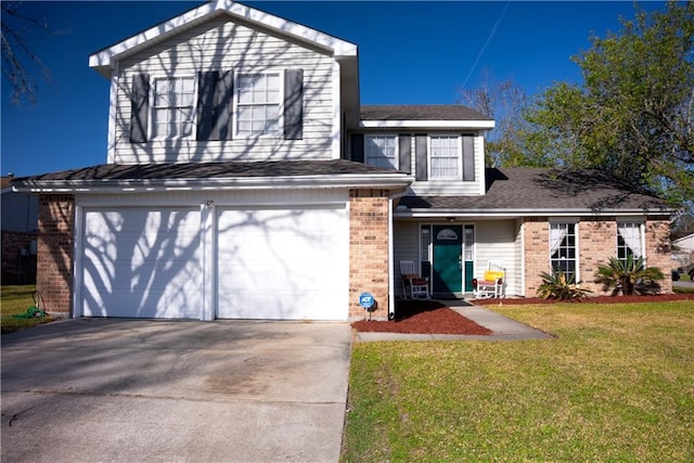 115 Silverwood Dr, Slidell, LA 70461 - view of front of house featuring brick siding, a front yard, concrete driveway, and an attached garage