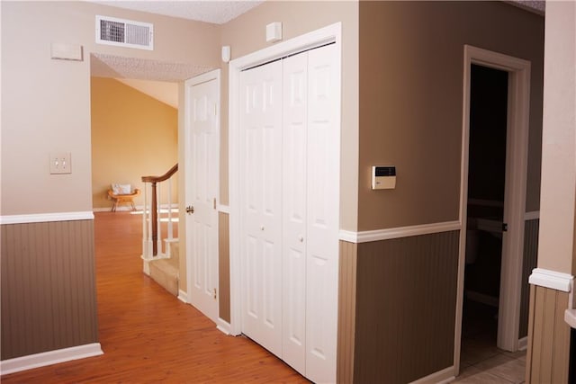 115 Silverwood Dr, Slidell, LA 70461 - hall with wood finished floors and visible vents