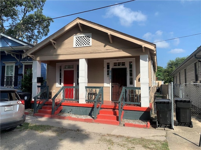 50507 N Salcedo St, New Orleans, LA 70119 - shotgun-style home featuring a porch