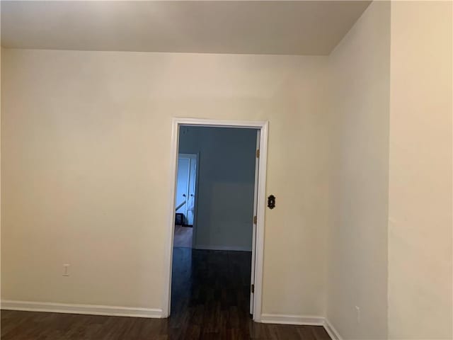50507 N Salcedo St, New Orleans, LA 70119 - spare room with dark wood-style floors and baseboards