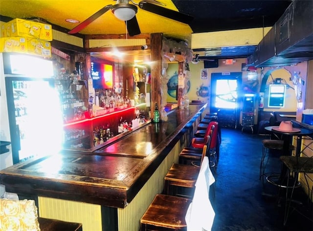 3801 Tchoupitoulas St, New Orleans, LA 70115 - bar with carpet flooring, a dry bar, and a ceiling fan