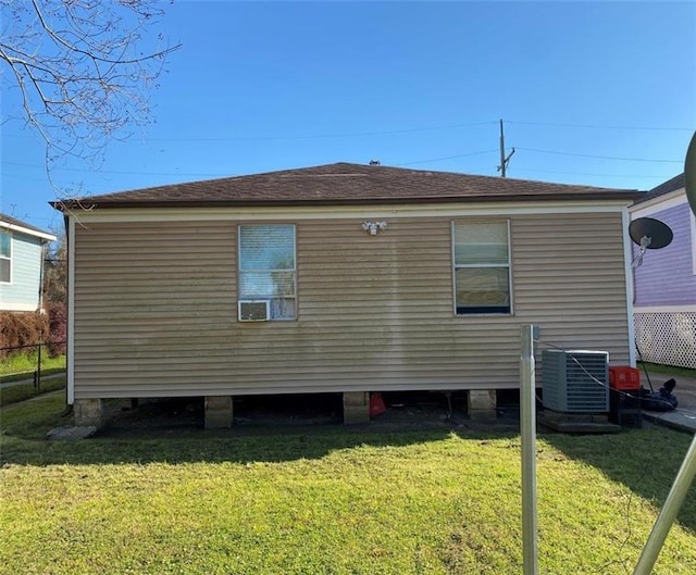 2547 Athis St, New Orleans, LA 70122 - back of property with central air condition unit