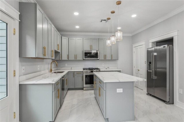 444244 S Johnson St, New Orleans, LA 70125 - kitchen featuring high end appliances, a sink, a center island, gray cabinetry, and visible vents