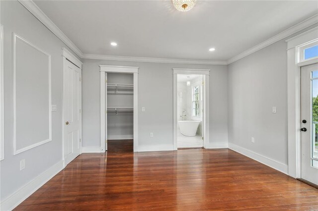 444244 S Johnson St, New Orleans, LA 70125 - unfurnished bedroom with crown molding, wood finished floors, ensuite bathroom, baseboards, and recessed lighting