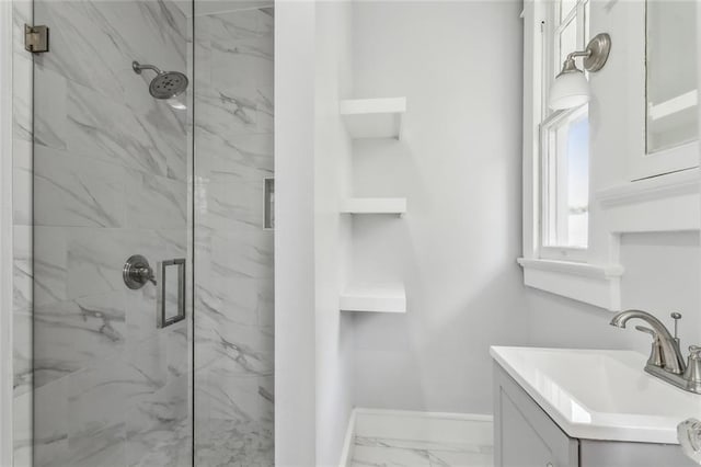 444244 S Johnson St, New Orleans, LA 70125 - bathroom with baseboards, marble finish floor, a marble finish shower, and vanity