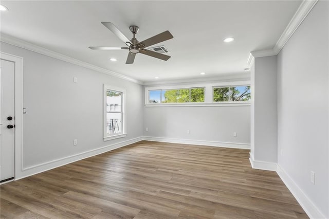444244 S Johnson St, New Orleans, LA 70125 - empty room featuring baseboards, visible vents, crown molding, and wood finished floors