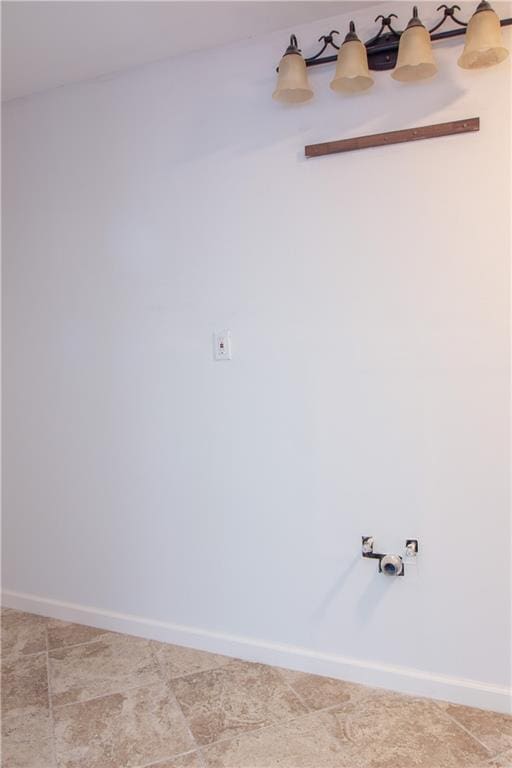 empty room with baseboards
