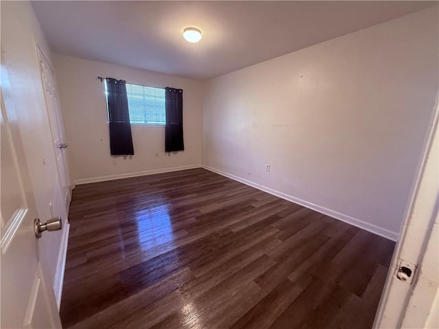 774-776 Holt Dr, Baton Rouge, LA 70815 - unfurnished room with dark wood-style flooring and baseboards