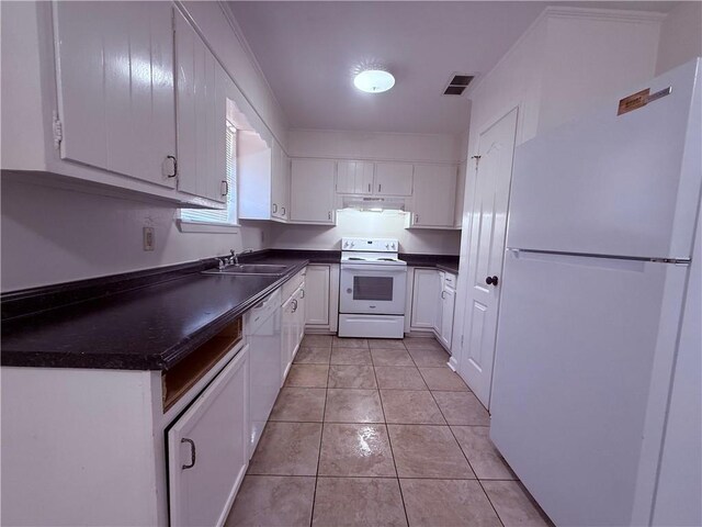774-776 Holt Dr, Baton Rouge, LA 70815 - kitchen featuring white cabinets, white appliances, dark countertops, a sink, and ventilation hood