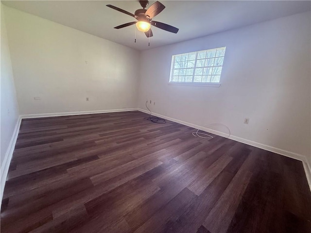 774-776 Holt Dr, Baton Rouge, LA 70815 - spare room with baseboards, dark wood-style flooring, and a ceiling fan