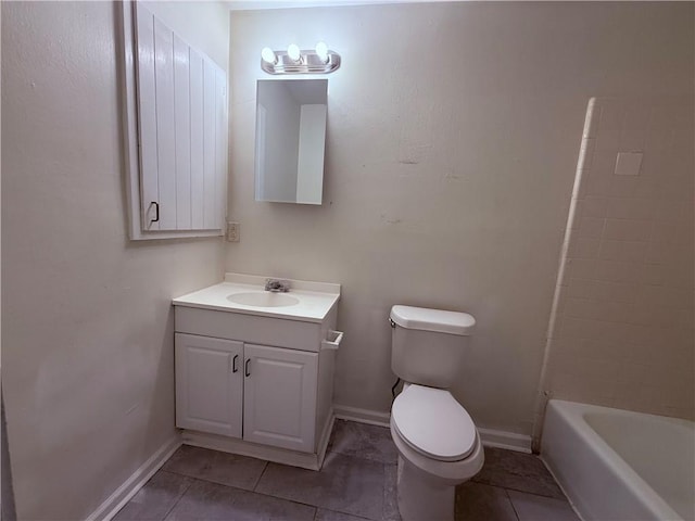774-776 Holt Dr, Baton Rouge, LA 70815 - bathroom featuring toilet, vanity, baseboards, and tile patterned flooring