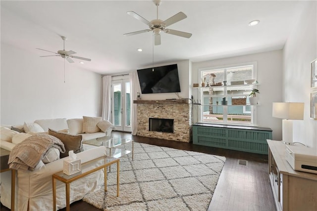 740 Florida Blvd, New Orleans, LA 70124 - living area with a ceiling fan, wood finished floors, radiator heating unit, a fireplace, and recessed lighting