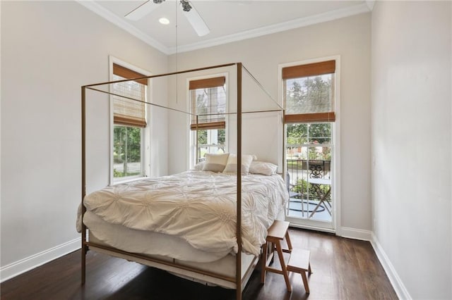 740 Florida Blvd, New Orleans, LA 70124 - bedroom featuring multiple windows, baseboards, dark wood-style flooring, and ornamental molding