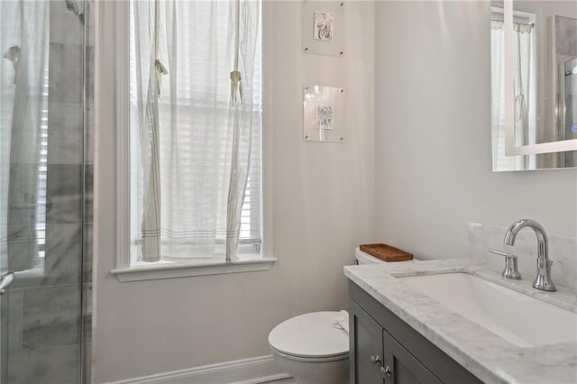 740 Florida Blvd, New Orleans, LA 70124 - bathroom with toilet, vanity, and a tile shower