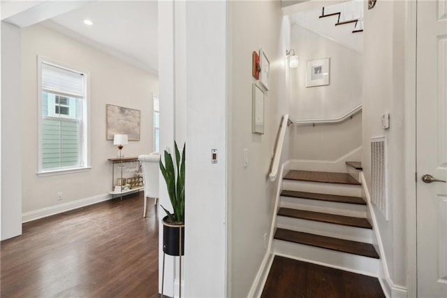 740 Florida Blvd, New Orleans, LA 70124 - staircase featuring baseboards, wood finished floors, recessed lighting, and ornamental molding