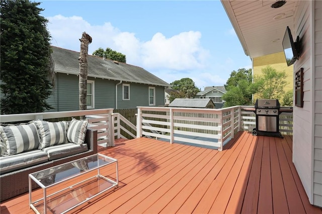 740 Florida Blvd, New Orleans, LA 70124 - wooden deck with outdoor lounge area and grilling area
