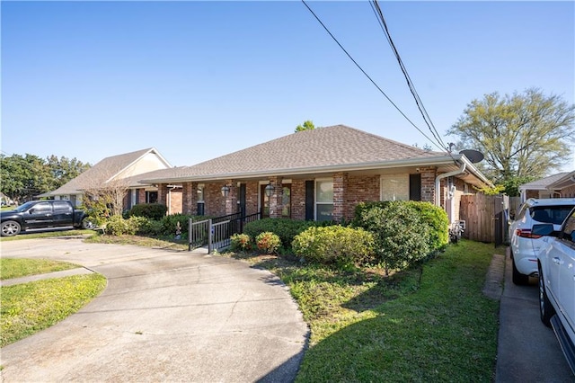 4012 Berot St, Metairie, LA 70002 - ranch-style home featuring brick siding and a gate