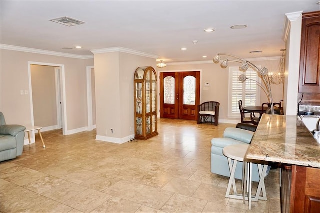 4012 Berot St, Metairie, LA 70002 - living area with baseboards, french doors, ornamental molding, a chandelier, and recessed lighting