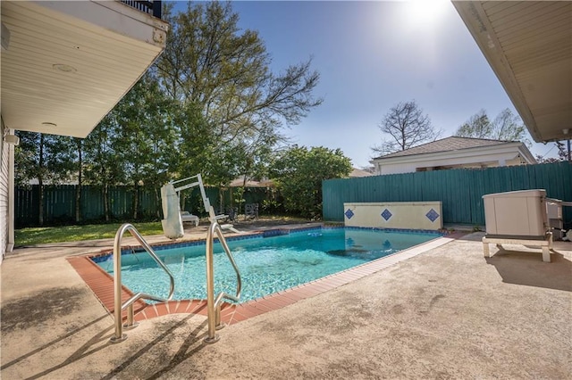 4012 Berot St, Metairie, LA 70002 - view of swimming pool featuring a patio area and a fenced backyard