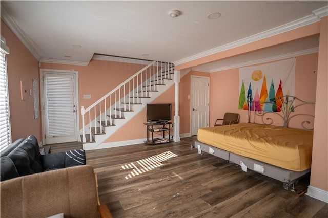 4012 Berot St, Metairie, LA 70002 - bedroom featuring wood finished floors, baseboards, and crown molding