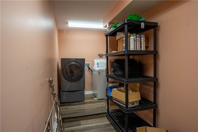 4012 Berot St, Metairie, LA 70002 - laundry area with washer and dryer and wood finished floors