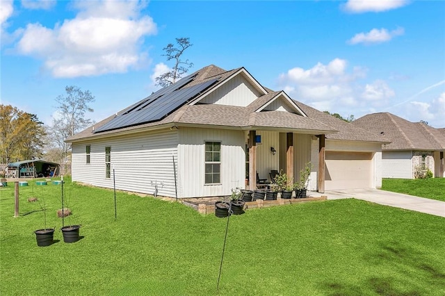 31527 Meadow Lark Ln, Denham Springs, LA 70726 - ranch-style home featuring a front lawn, driveway, roof with shingles, solar panels, and an attached garage
