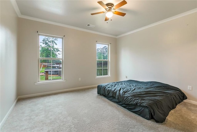 31527 Meadow Lark Ln, Denham Springs, LA 70726 - bedroom featuring carpet flooring, ceiling fan, crown molding, visible vents, and baseboards