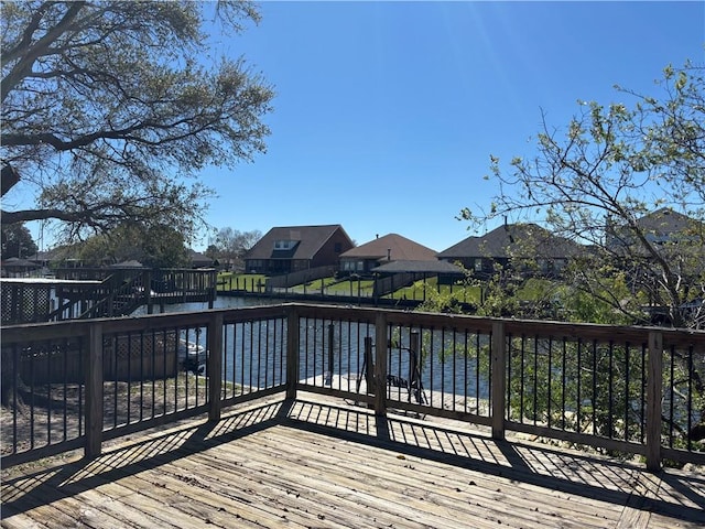 416 Marina Dr, Slidell, LA 70458 - deck featuring a water view and a residential view